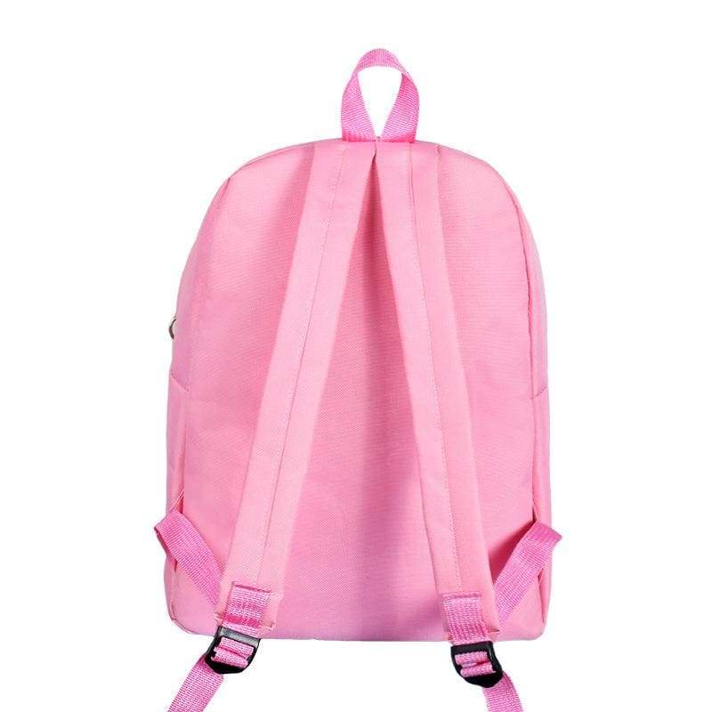 a girl in a pink bag